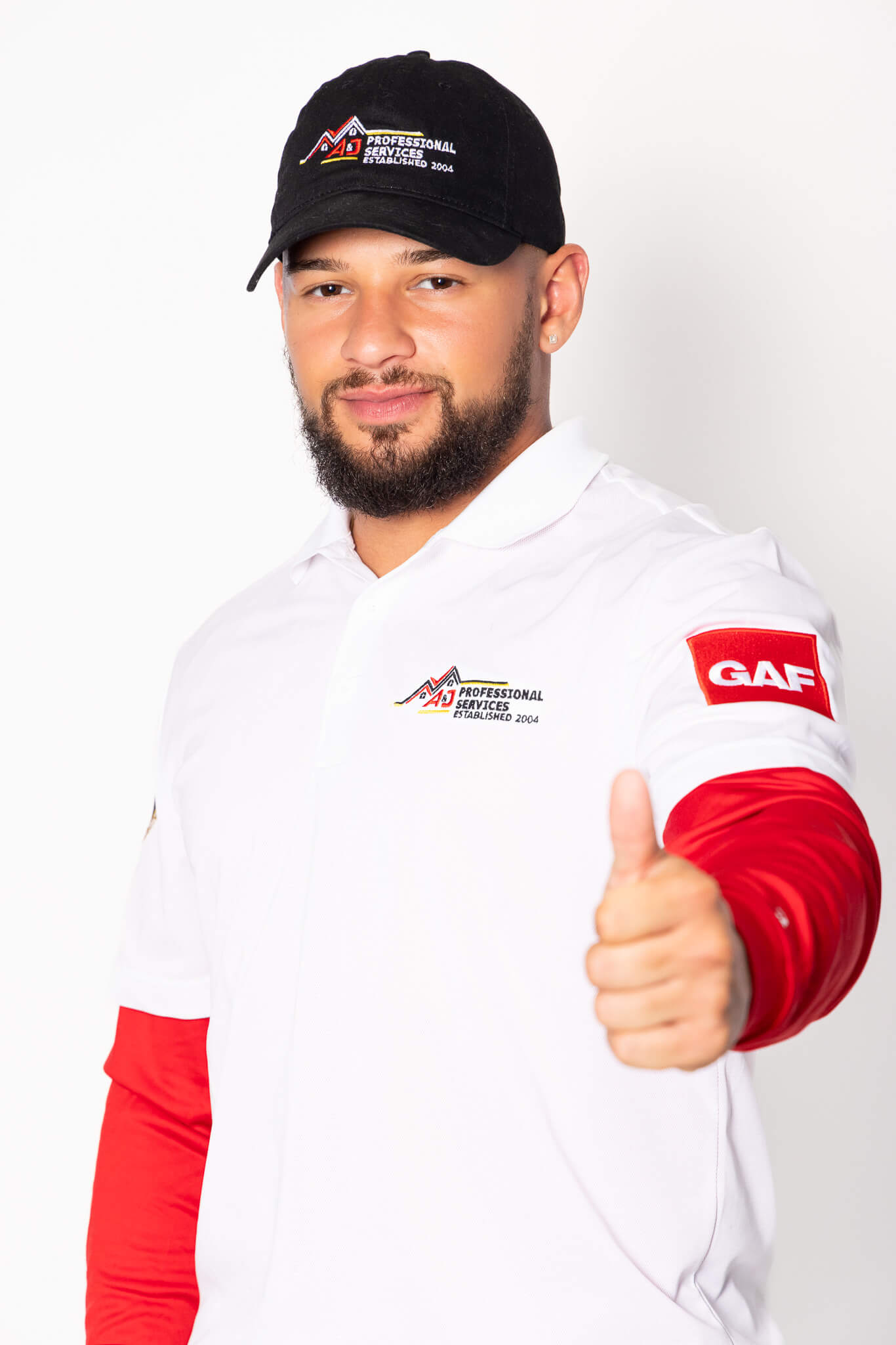 An A&J Pro Roofers crew member