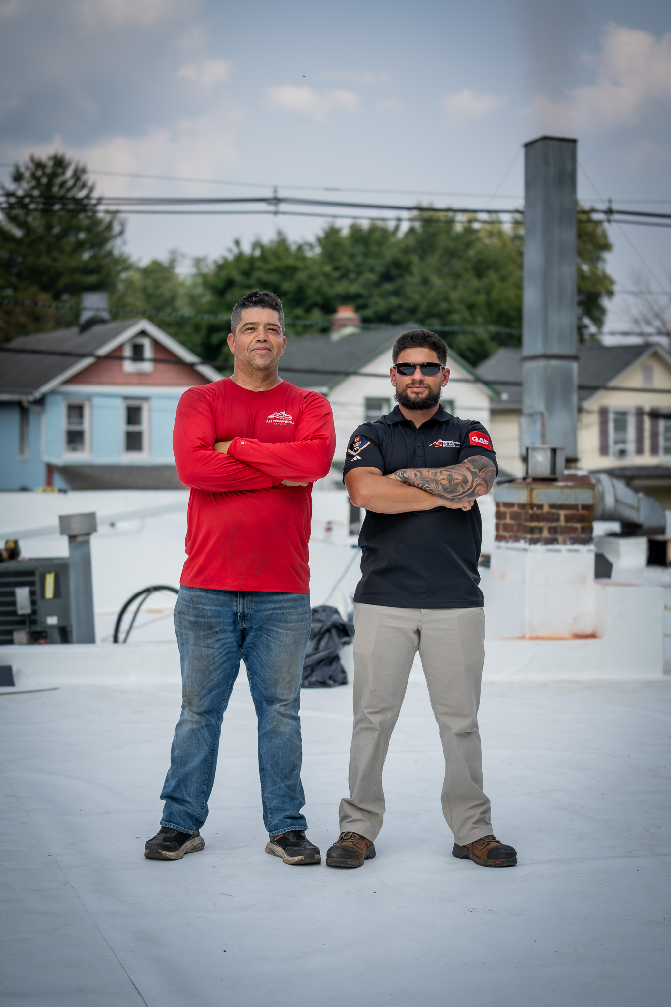 Christian and the A&J Pro Roofers crew on a completed commercial flat roof
