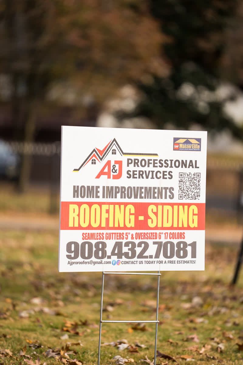 A&J Pro Roofers sign with GAF Master Elite badge